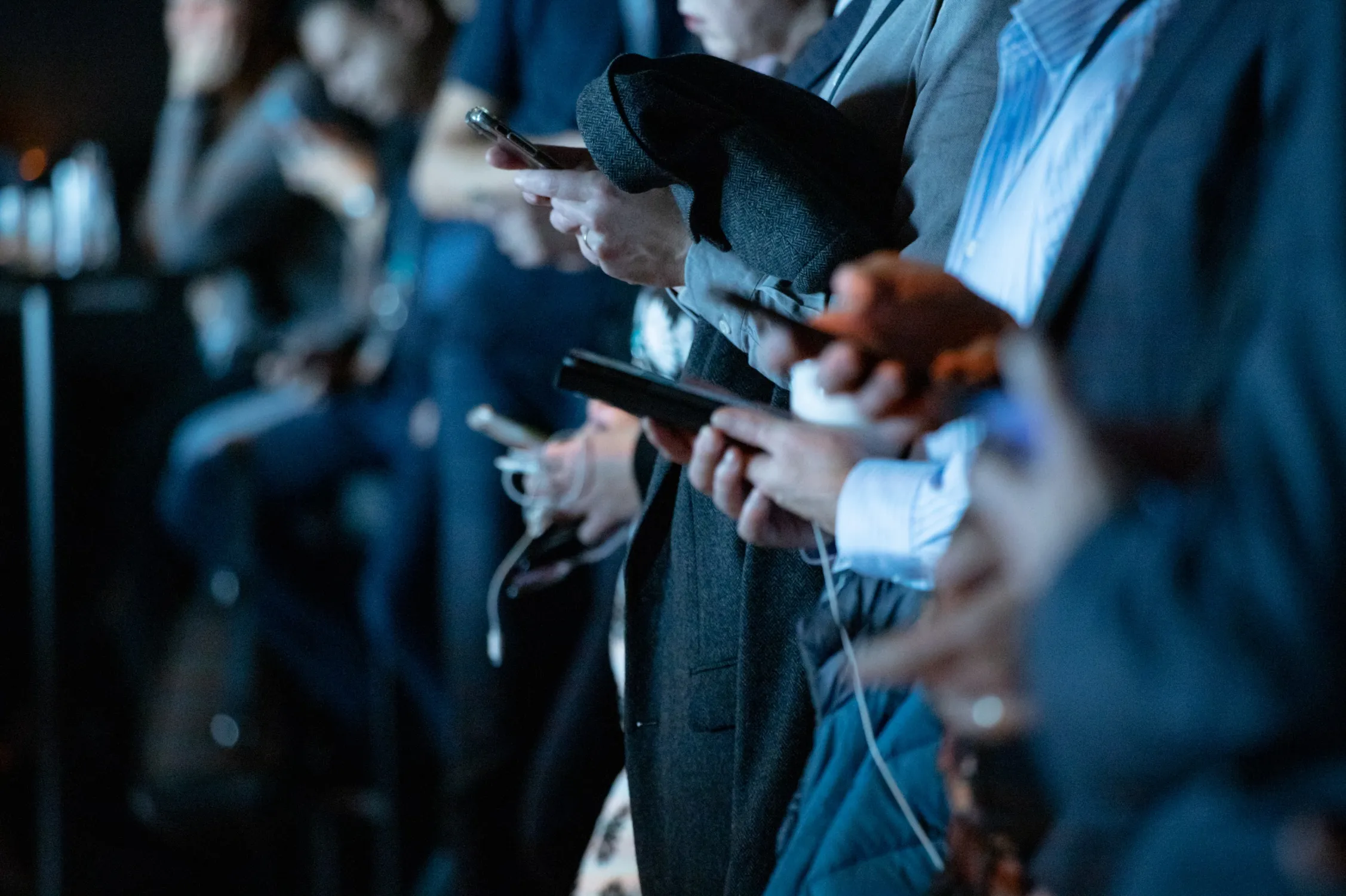 crowd using mobiles